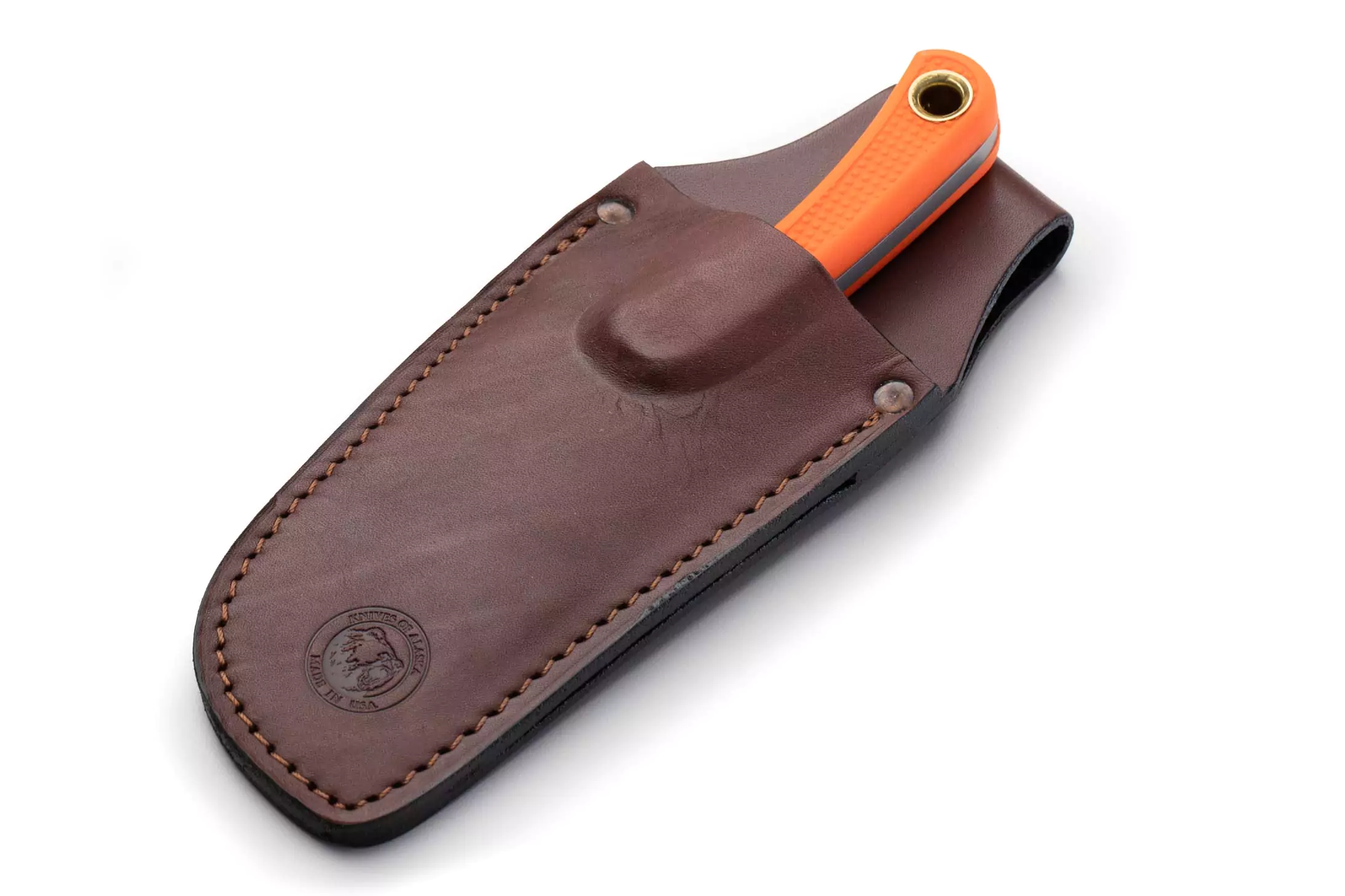 The Caribou knife with orange Suregrip handle sheathed in a brown leather case