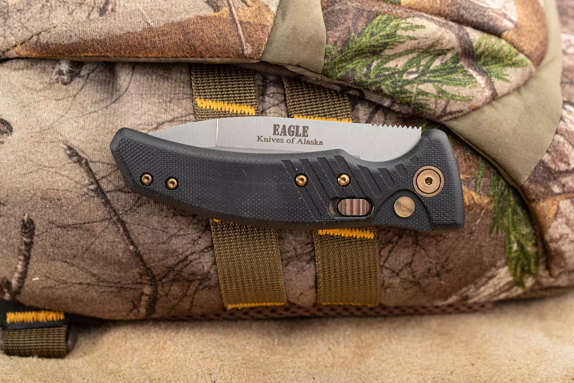 Eagle Auto folding knife by Knives of Alaska with Magnacut blade and G10 handle