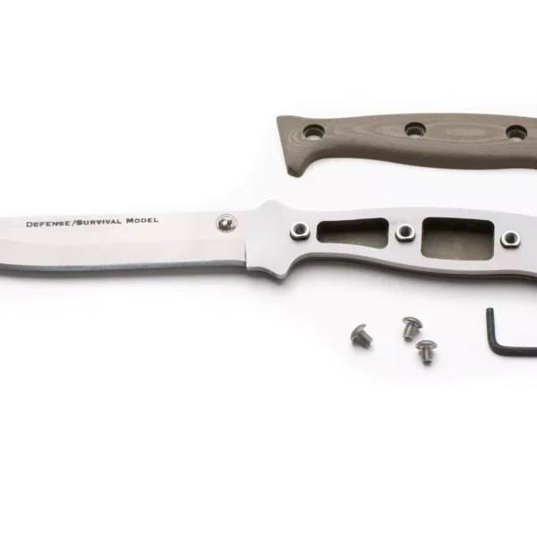 Disassembled Defense Survival knife showing D2 steel blade, skeletonized tang, G10 handle scale, screws, and hex key for assembly.