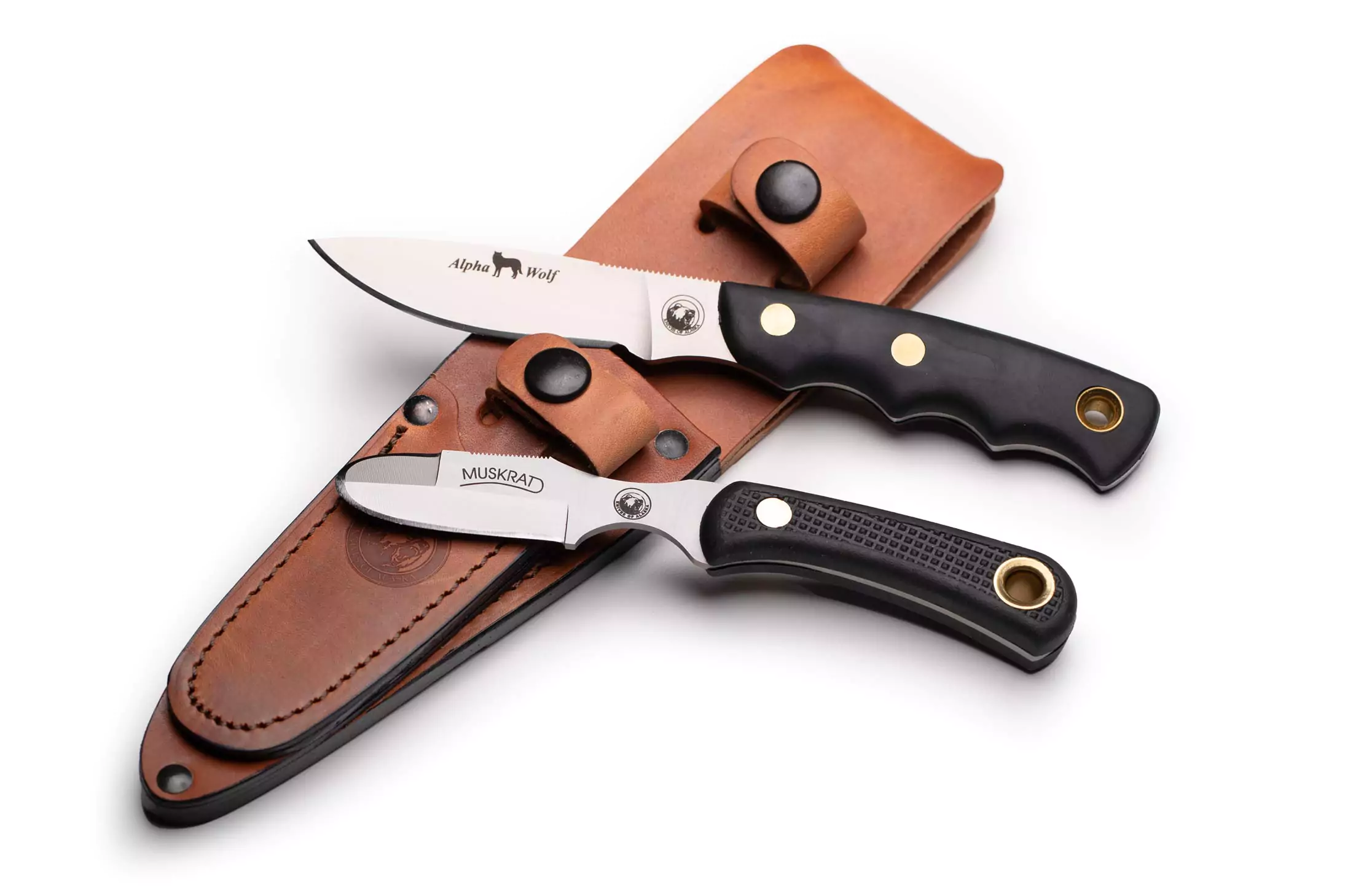 Alpha Wolf and Muskrat knives with Suregrip handles and leather sheath