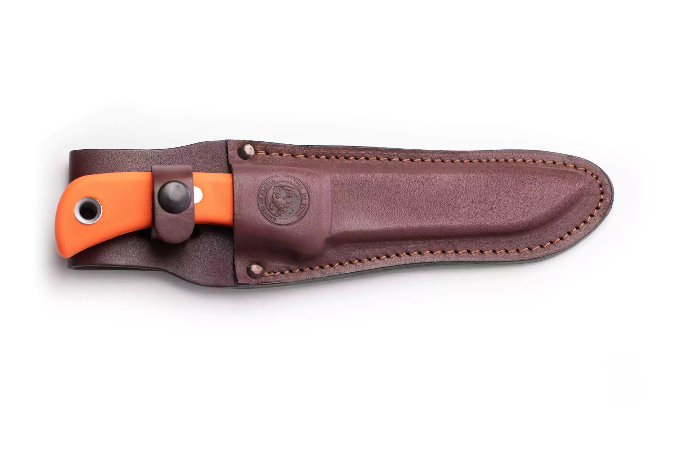 Magnum Wolverine knife sheathed with orange Suregrip handle visible