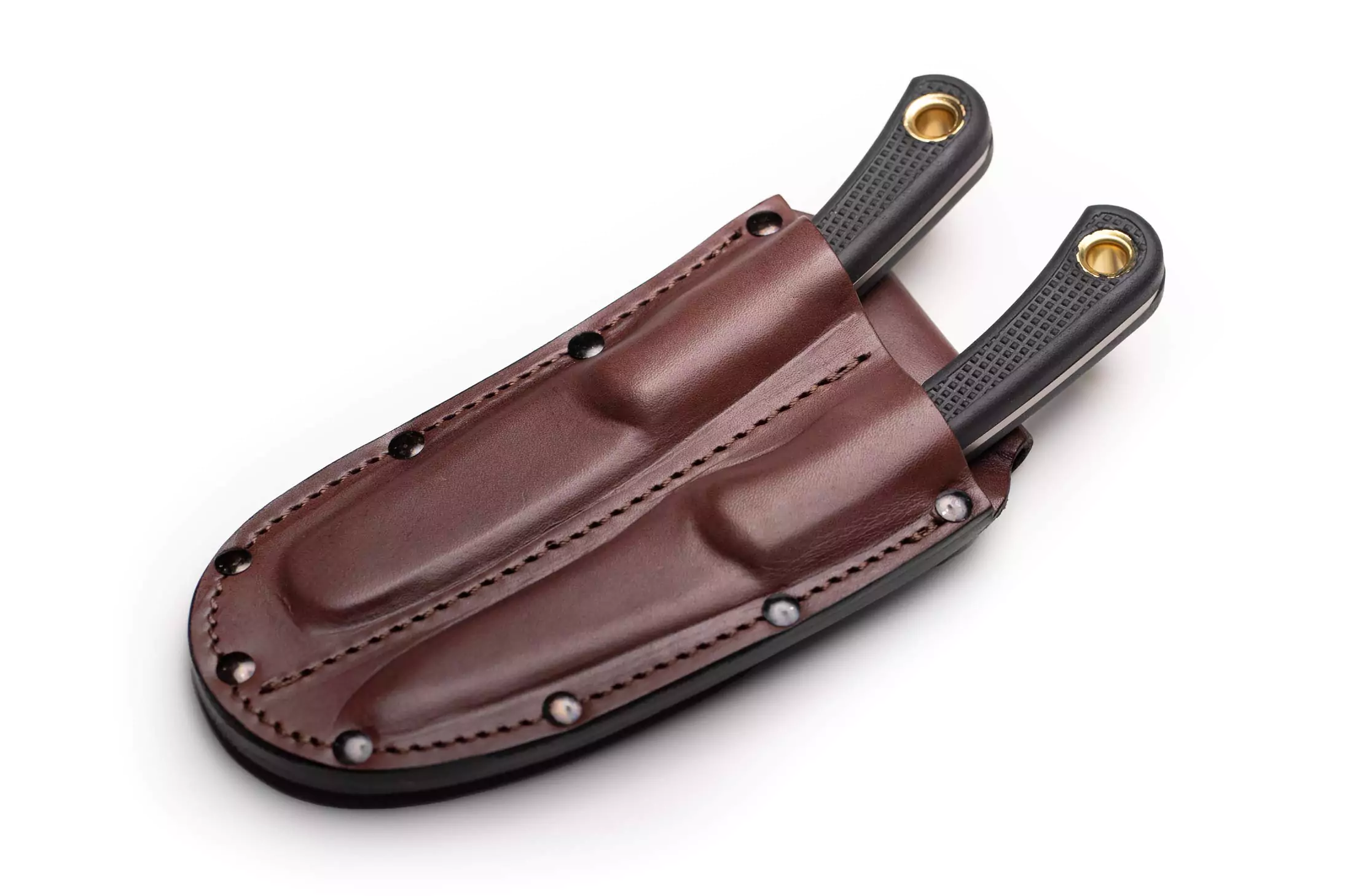 Knives of Alaska leather sheath with Muskrat and Cub Bear black handle knives partially inserted