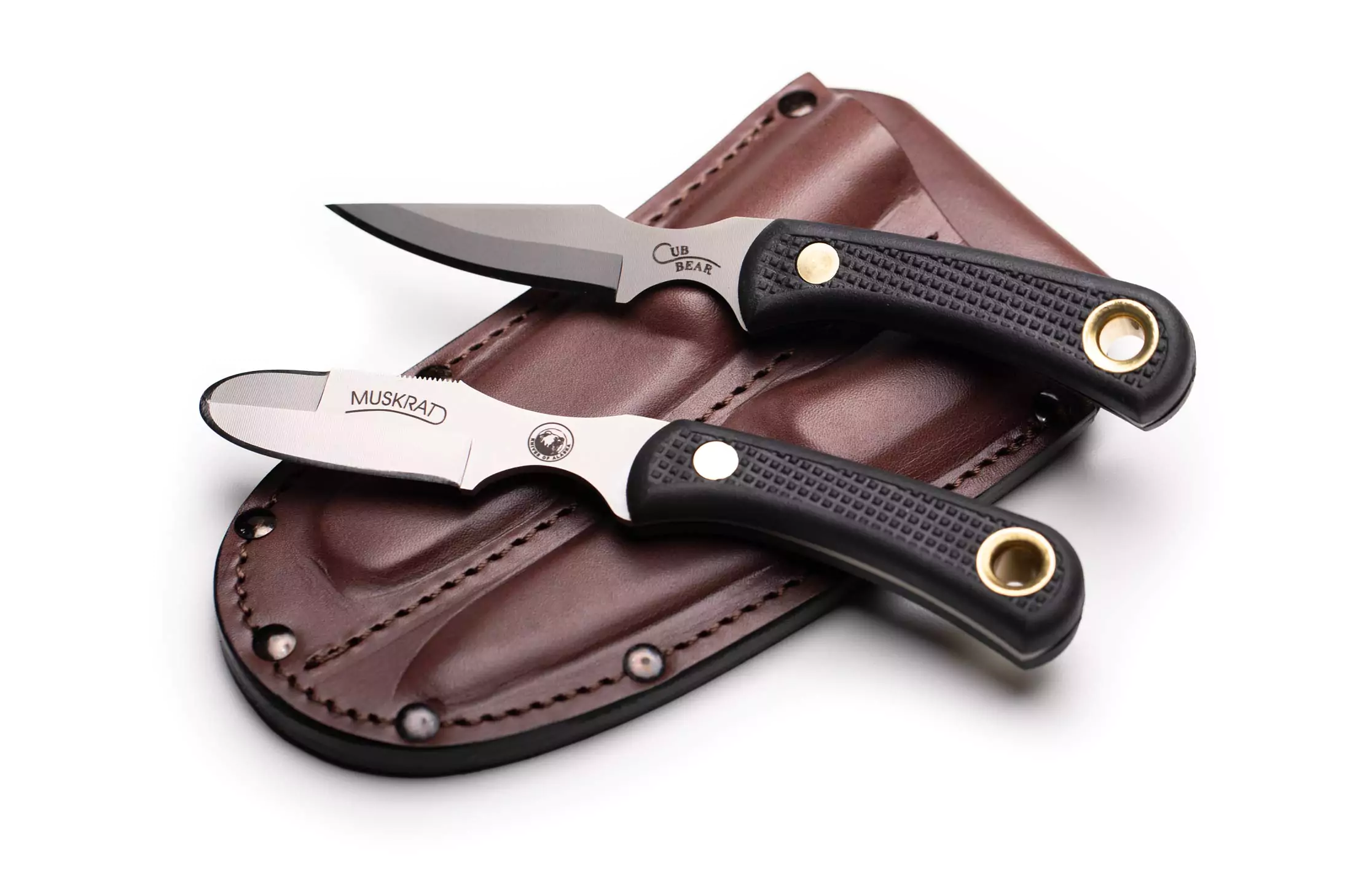 Knives of Alaska Muskrat and Cub Bear combo set with black Suregrip handles on leather sheath