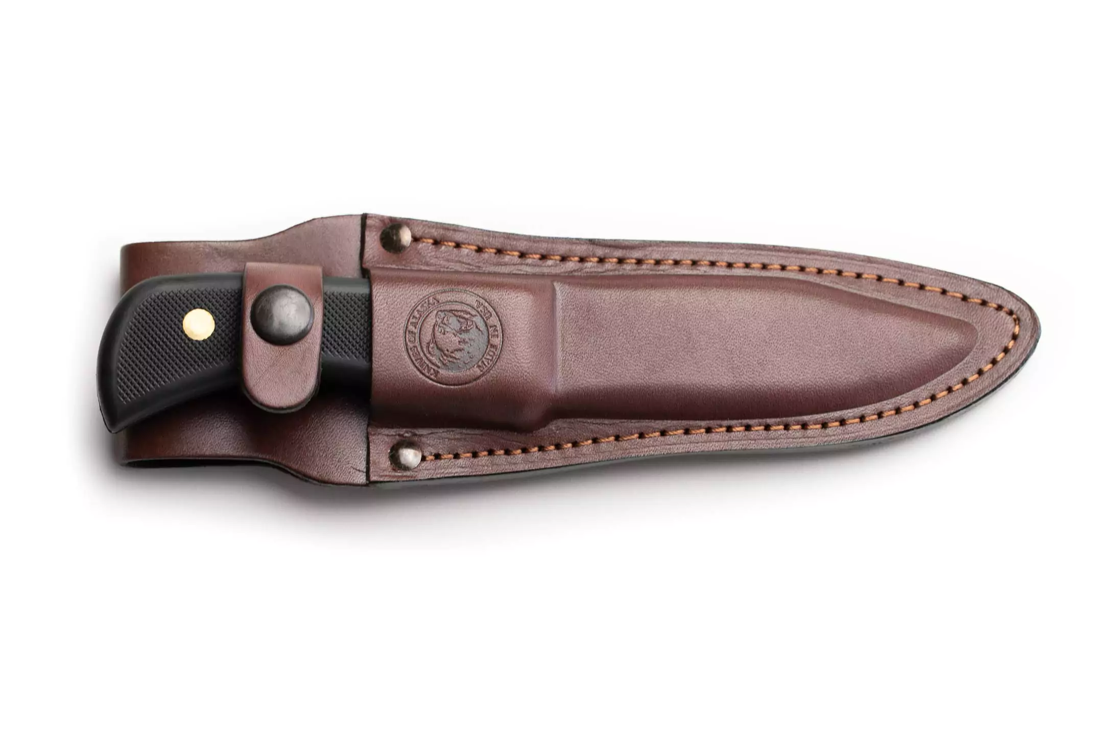 Trekker Elk Hunter knife with SureGrip handle secured inside a premium leather sheath, crafted with D2 tool steel.
