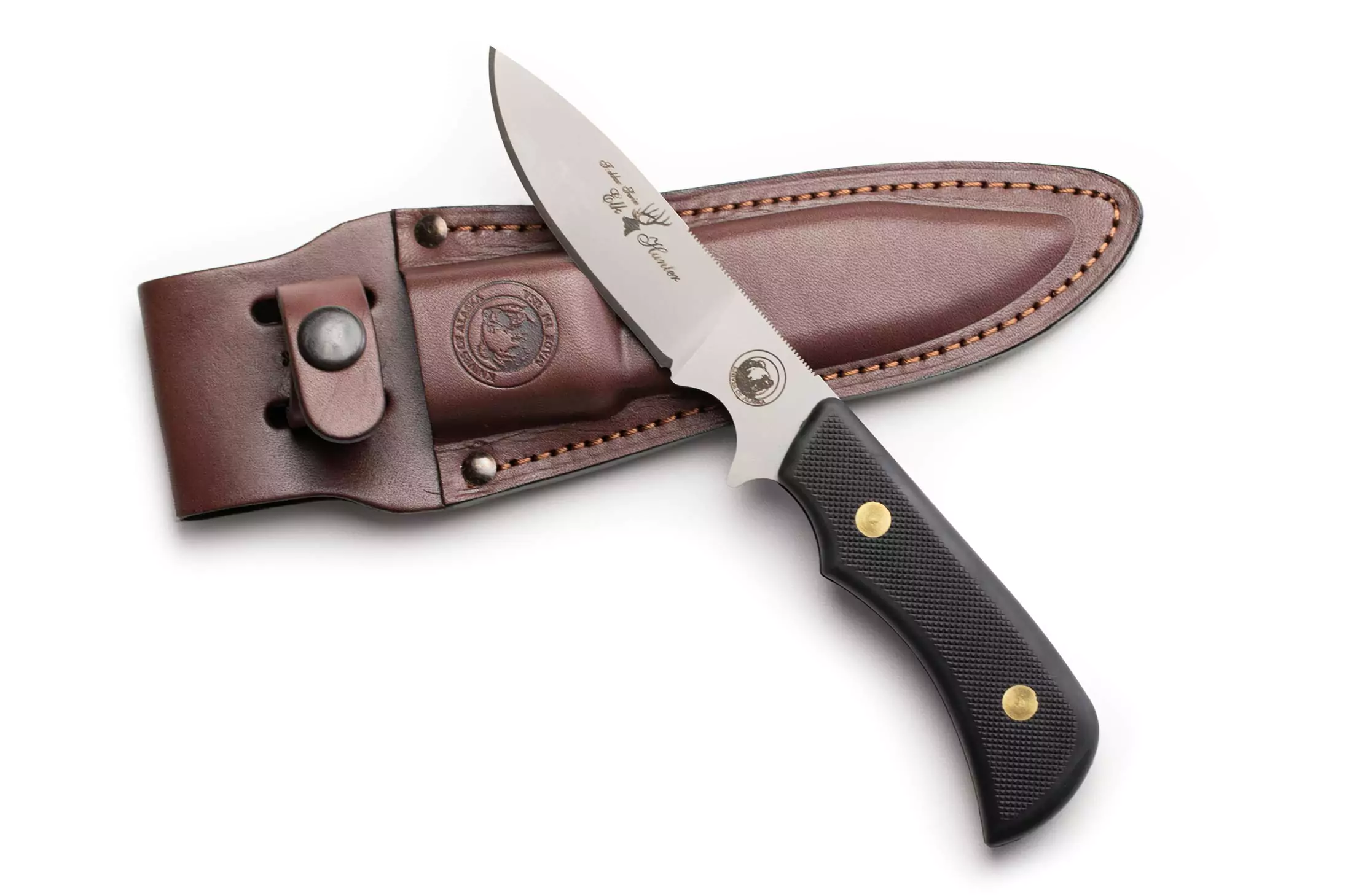 Trekker Elk Hunter knife with SureGrip handle and D2 tool steel blade displayed on top of a leather sheath.