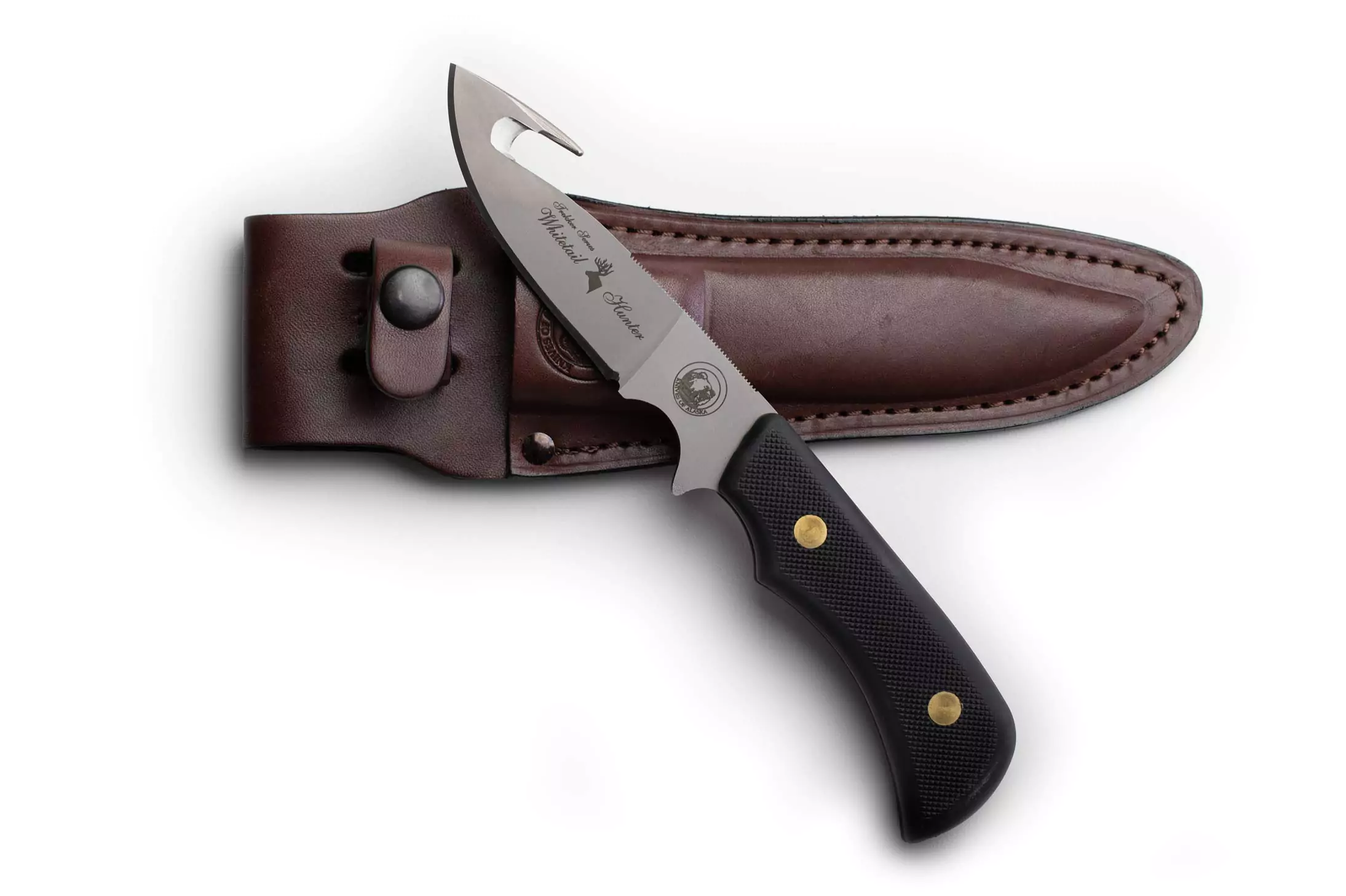 Trekker Whitetail knife with black Suregrip handle and leather sheath.
