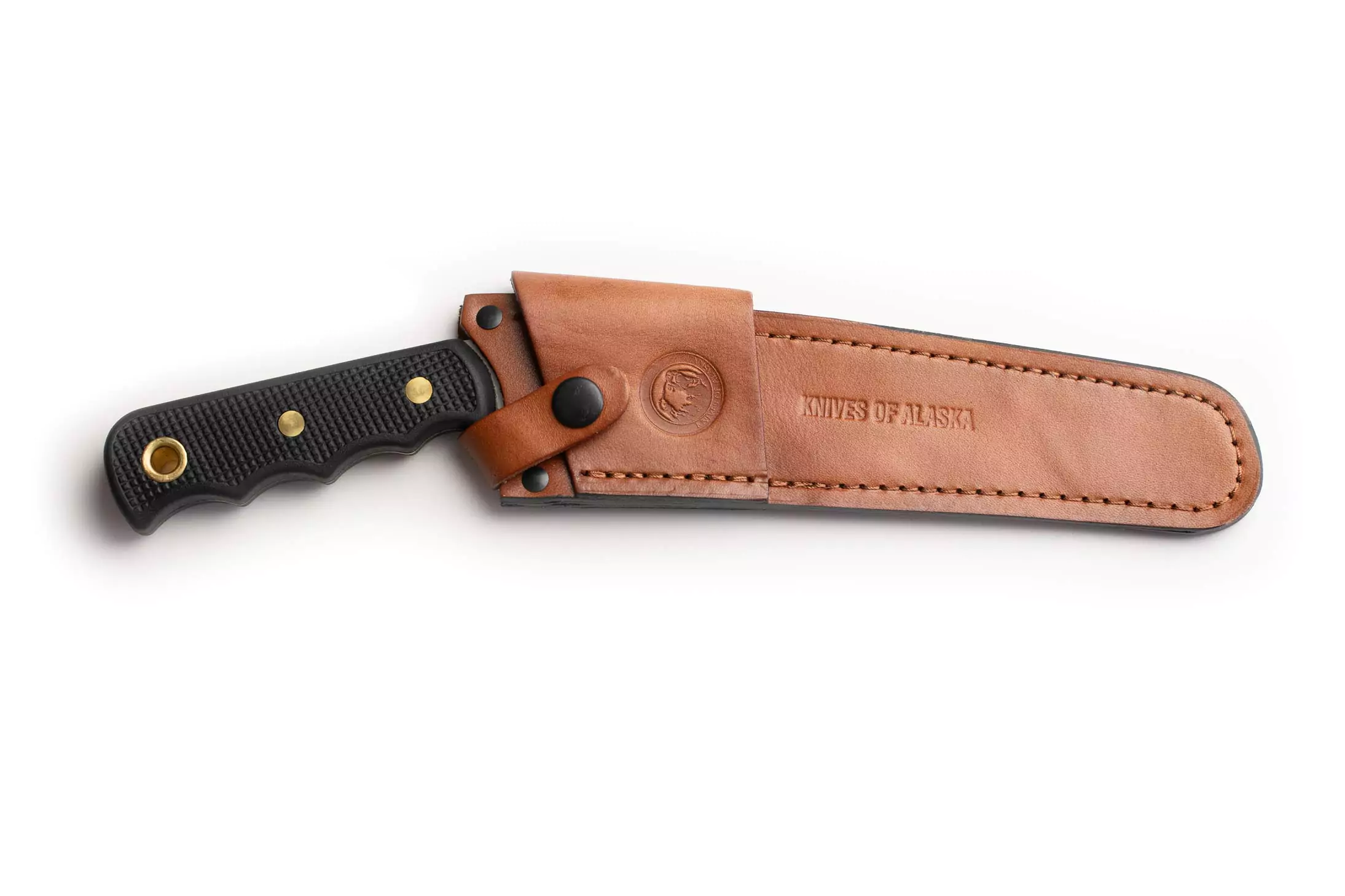 Knives of Alaska Wood Saw secured in a brown leather sheath.