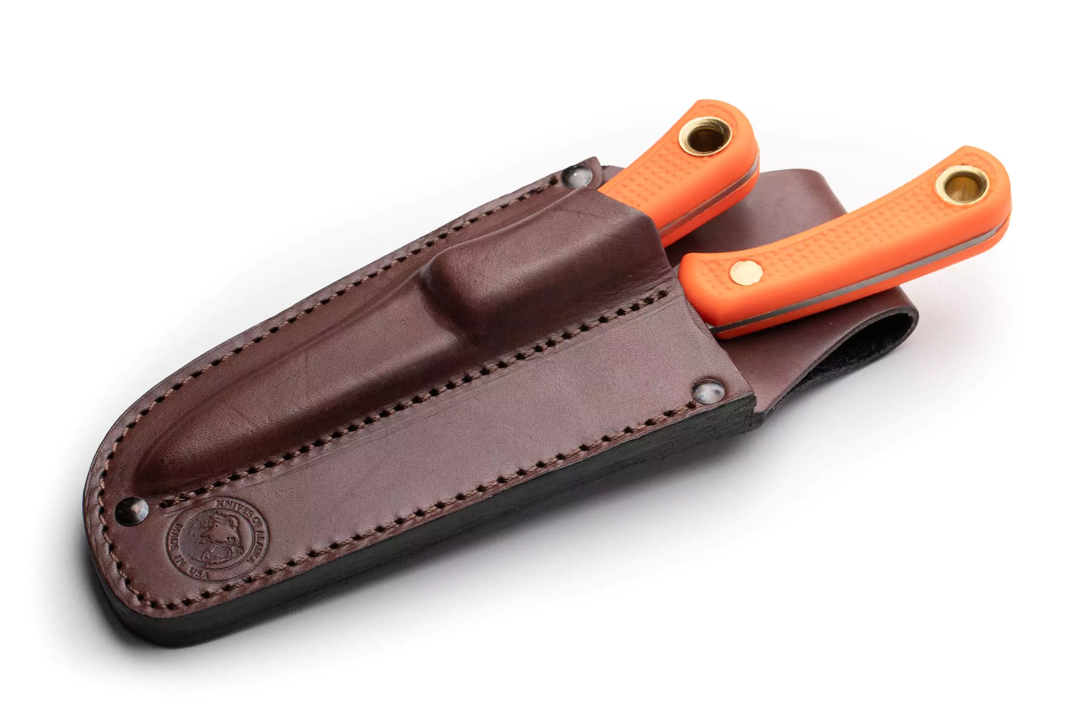 Knives of Alaska Caribou and Cub Bear combo set with orange Suregrip handles in a brown leather sheath.