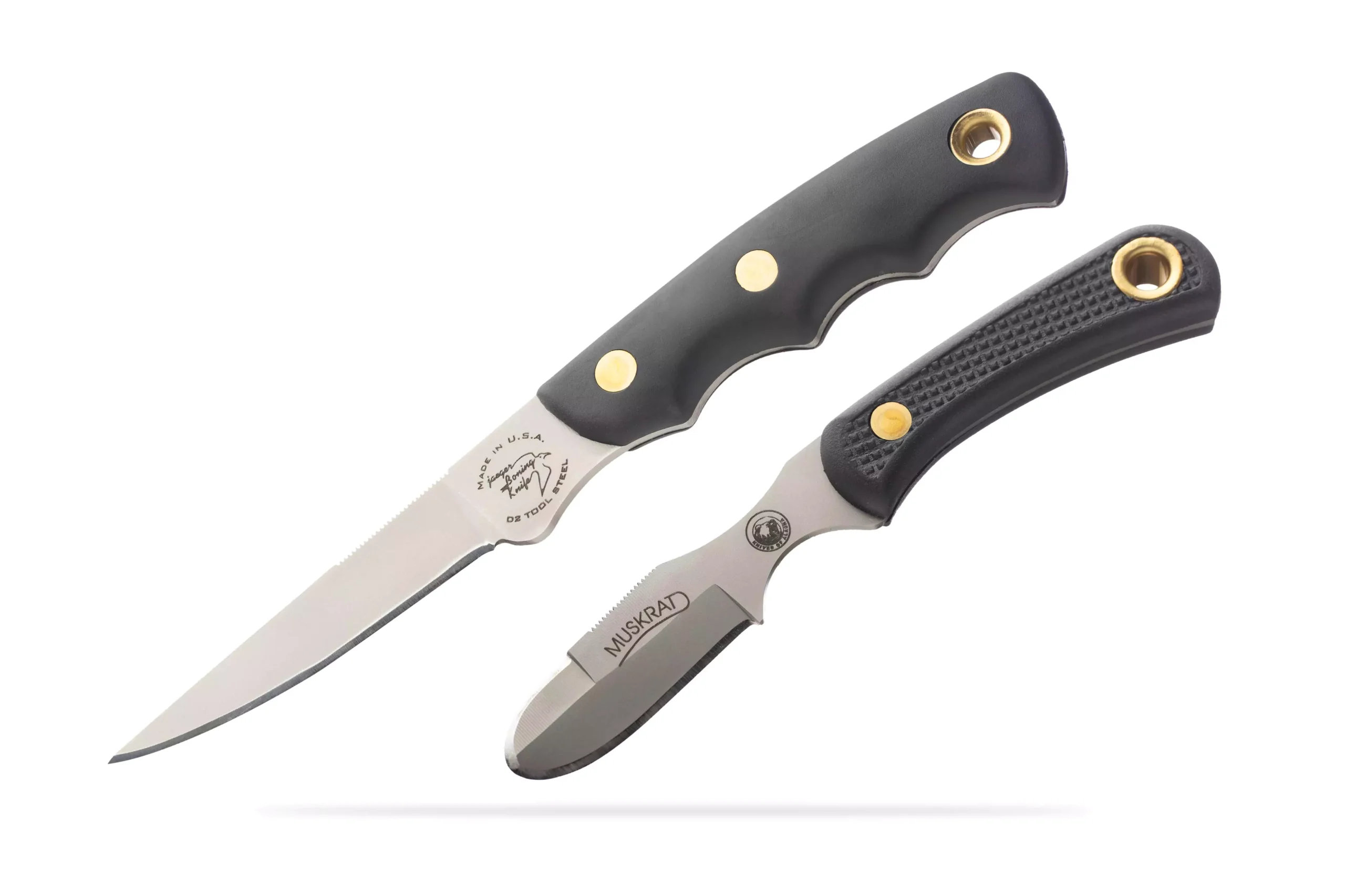 Jaeger and Muskrat knives with black Suregrip handles and D2 steel blades.